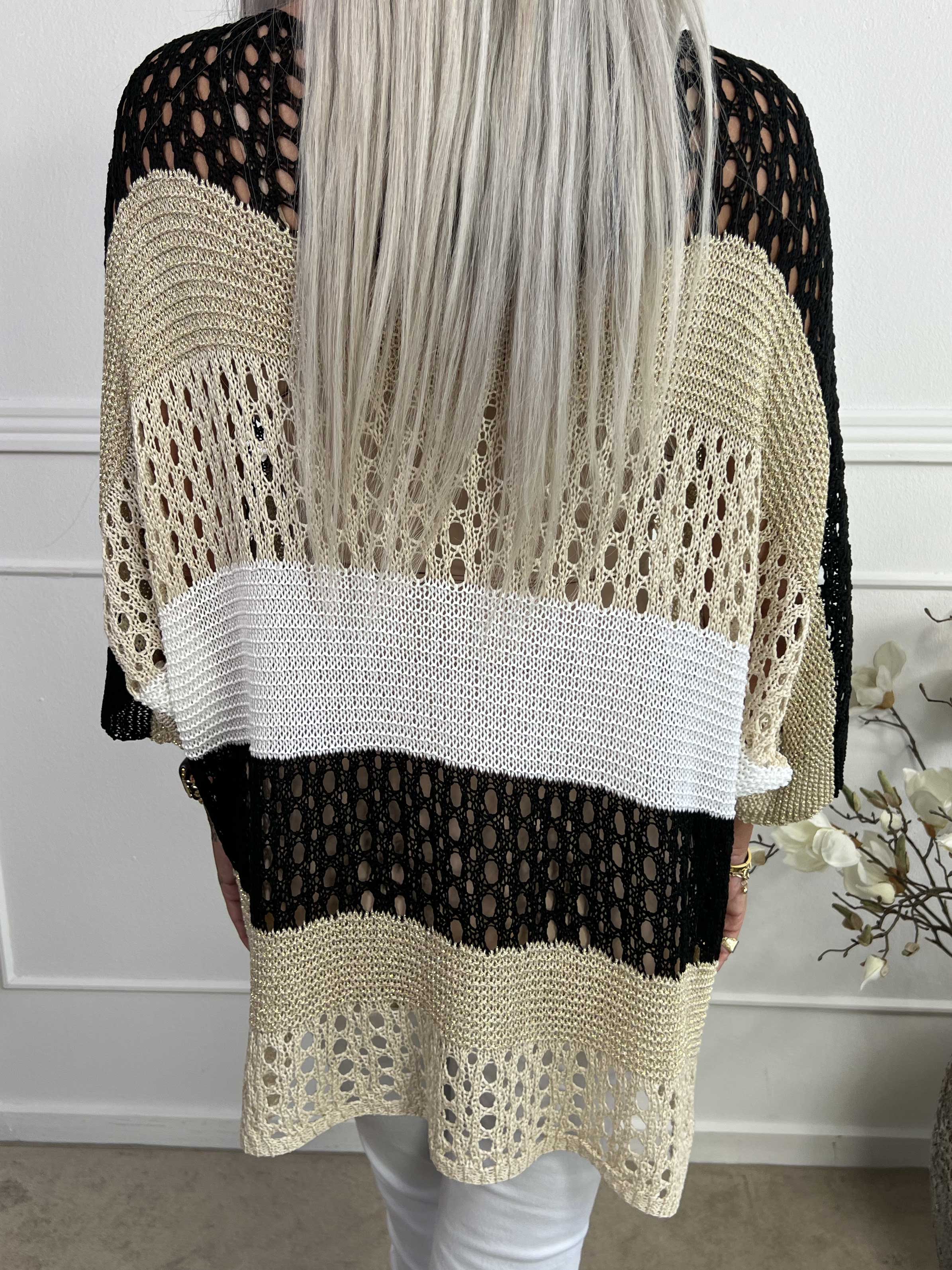 Evelina - Stribet strik med hulmønster og glimmertråde